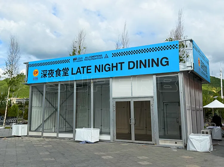 Custom 10x5m inflatable flat-top event tent used for brand exhibitions at sports events.