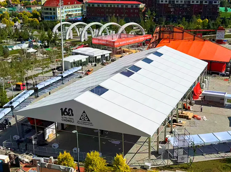 Heavy-duty 6x20m warehouse tent providing secure logistics storage for trail running events.